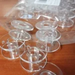 Hot sell 30pc Sewing Bobbins Spool Transparent Plastic Empty Bobbins For Brother Sewing Machine 5BB5552