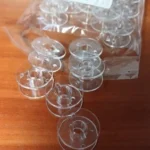 Hot sell 30pc Sewing Bobbins Spool Transparent Plastic Empty Bobbins For Brother Sewing Machine 5BB5552