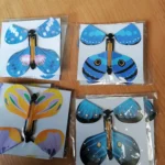 Magic Flying Butterflies Wind Up Toy In The Sky Bookmark Greeting Cards Rubber Band Powered Kids Magic Props Surpris Gift